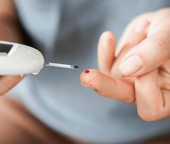 Checking blood glucose level, close-up